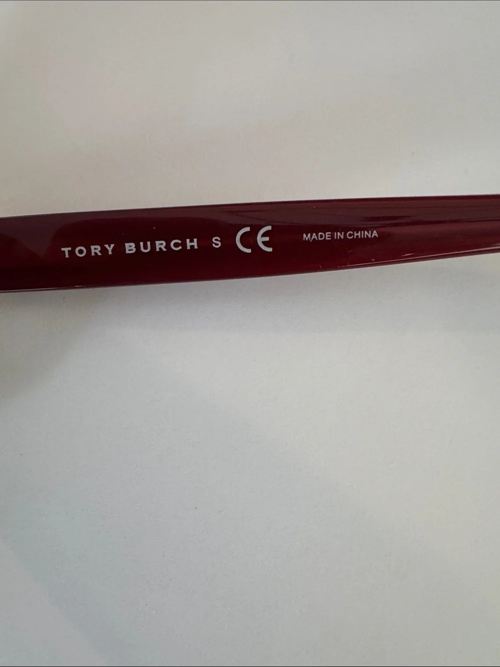 Tory Burch sunglasses.